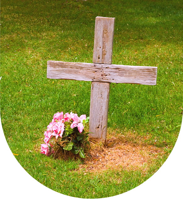 Grave with a cross and flowers