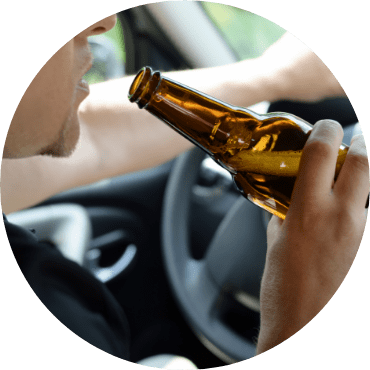 Person drinking and driving